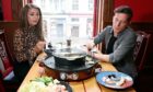 Karla and Andy get to grips with the hotpot.