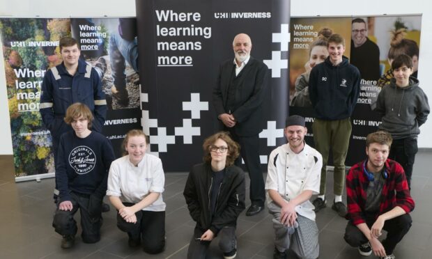 Chris O’Neil, principal of UHI Inverness, with students from the university.