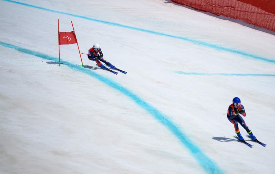 Andrew Simpson leading his brother Neil Simpson down the slopes at the Paralympics