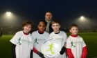 The Scottish Football Partnership have sponsored LED floodlighting at Spain stadium in Aberdeen to help the club become more sustainable and aim towards Net Zero Carbon.
Pictured are Stuart MaCaffrey from the Football Partnership along members of one of Banks o' Dee Albion's youth teams, from left, Davi Howe, Timothy Ogedengbe, Jake Ledford and Jake Winton. Picture by Paul Glendell