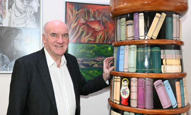 Hugh Little visits Robert Gordon's College to see the lighthouse he bid for and won in the Clan Light the North event charity auction. Photo Paul Glendell