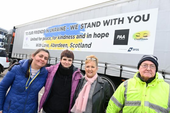 Organisers Adrianna Sosnowska, from Own Woman, and Kasia Cwiklinska, from the Polish Association of Aberdeen, with MCM owners Anna and David McMillan.
Picture by Paul Glendell     11/03/2022