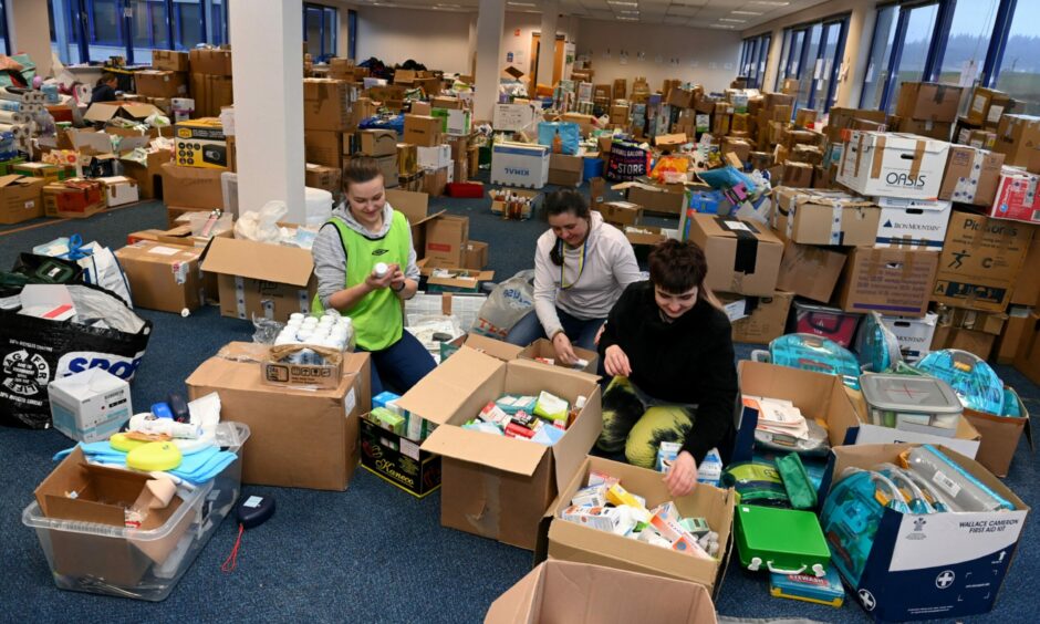 volunteers help send donations to ukraine