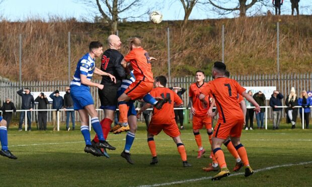 Dyce goalkeeper Andy Pennycook up for a corner towards the end of the game in a desperate attempt to equalise.  
Picture by Paul Glendell