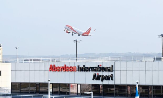 An easyJet flight taking off from Aberdeen International airport
