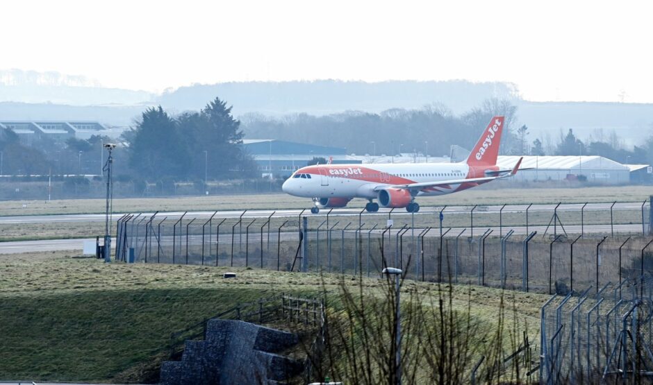 An easyJet plane taking off from Aberdeen en route to manchester