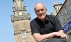 George Alexander with Tolbooth in Forres town centre behind.