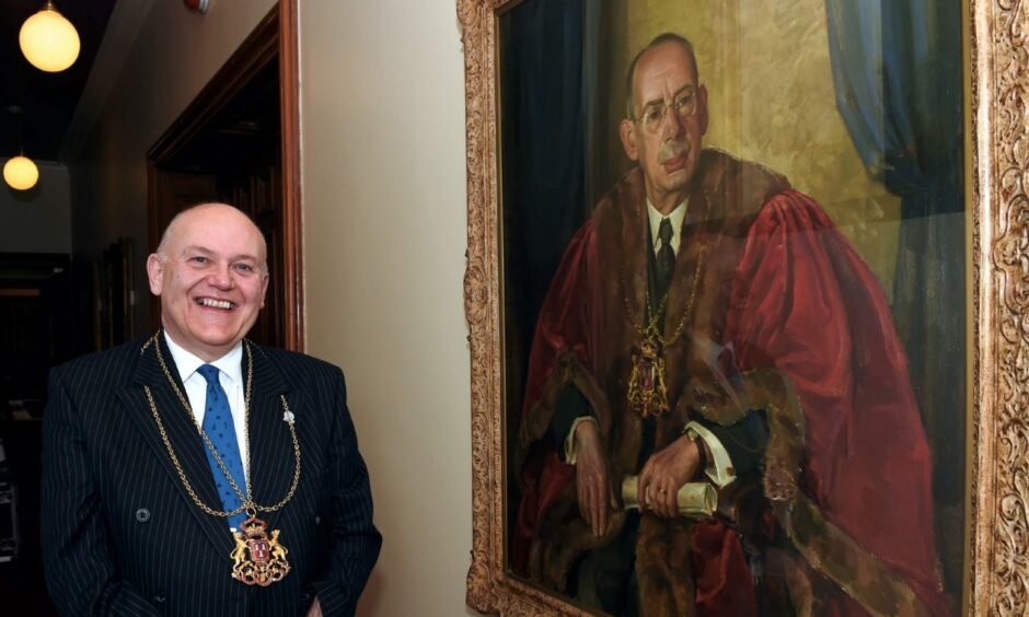 Lord Provost of Aberdeen, Barney Crockett among portraits of his predecessors. Picture by Heather Fowlie/DCT Media.