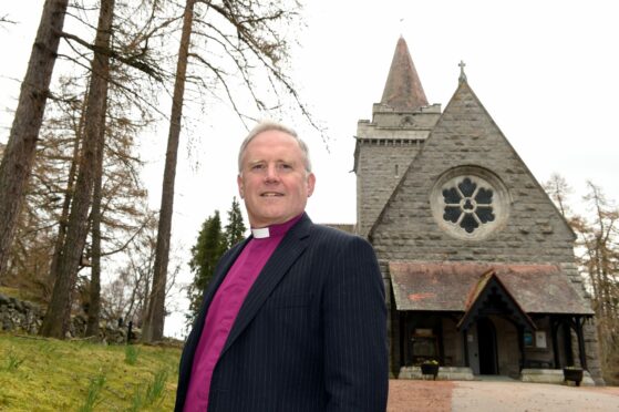 Rev Ken Mackenzie outside Crathie Kirk near Balmoral.