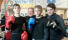 Inverness City ABC boxers (from left): Adian Williamson, George Stewart and Calum Turnbull with head coach Laurie Redfern.