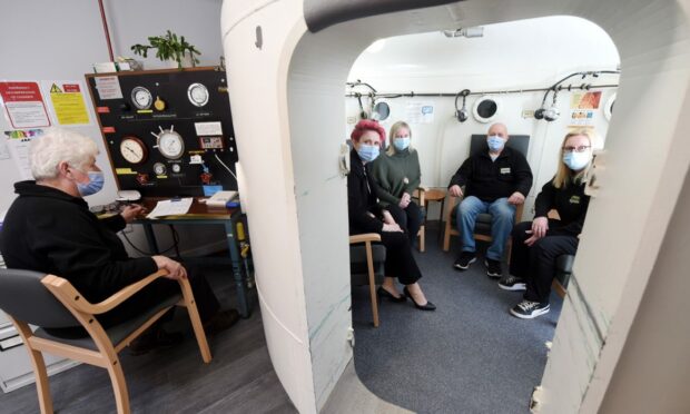 Staff members (L-R) Shena Finlay, Leigh-Ann Little, chief executive, Jenni Donnelly, Grahame MacDonald and Nichola Douglas at the oxygen chamber