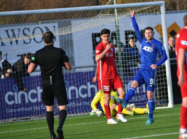 Mitch Megginson found the net twice for Cove against Peterhead