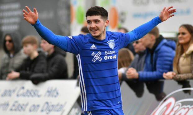 Jack Brown celebrates his winner for Peterhead.