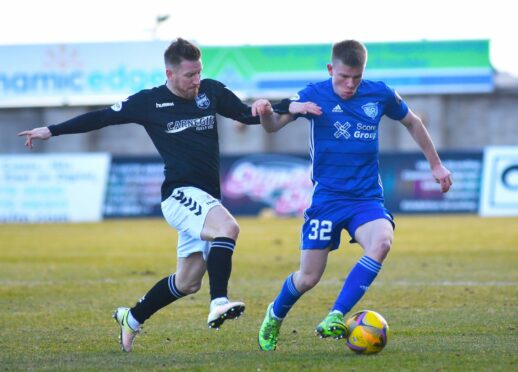 Flynn Duffy in action for Peterhead against Montrose