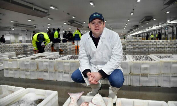Douglas Ross on a visit to Peterhead Fish Market.