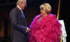 The Prince of Wales meets drag queen May McFettridge at the re-opening of the Grand Opera house, Belfast, on the second day of his two-day visit to Northern Ireland. Picture by Niall Carson/PA Wire