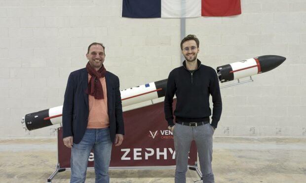 Robin Huber, director of business development of SaxaVord UK Spaceport and Stanislas Maximin, chief executive of Venture Orbital Systems with a model of the Zephyr rocket which is set to launch from Shetland in 2024.