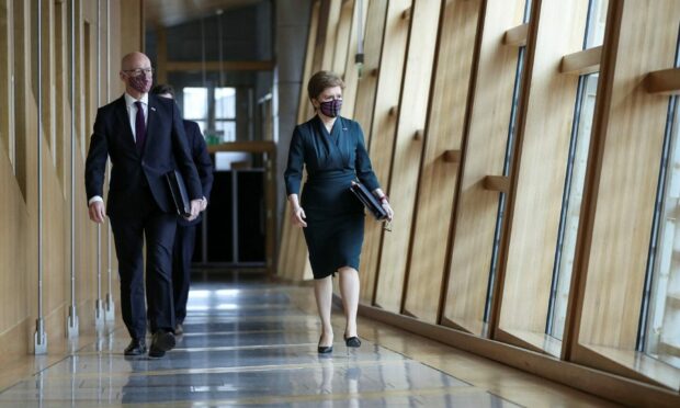 Scotland's First Minister Nicola Sturgeon arriving for First Minster's Questions at the Scottish Parliament in Holyrood. Picture by PA.