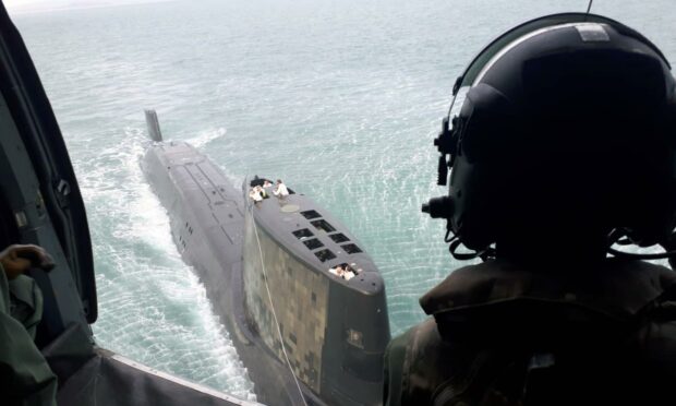 The Navy’s most advanced submarine, an Astute-class hunter-killer – and its most potent adversary, a Merlin Mk2 helicopter – played cat and mouse during a training exercise off the coast of Scotland.