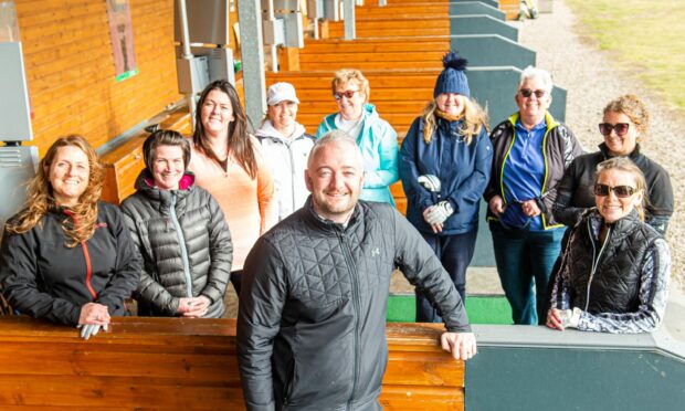 Peter Myers with some of his group of female golfers