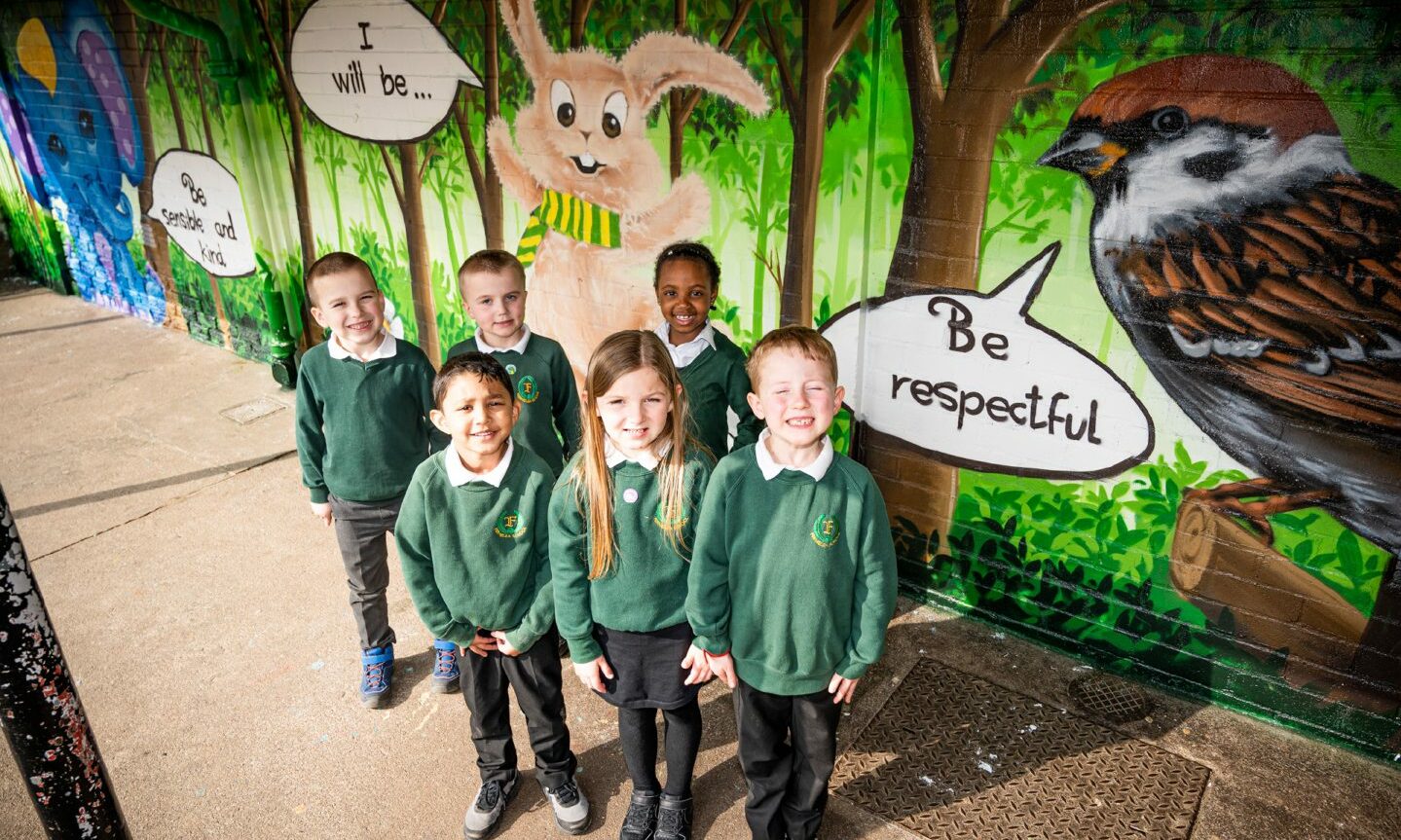 P2 pupils, Riley Forrest, Mia Clark, Chisimdi Ndukwu, Aron Tivador, Jamie Sadler and Shakib Ahmed, in front of the new mural at Fernielea Primary. Picture by Wullie Marr