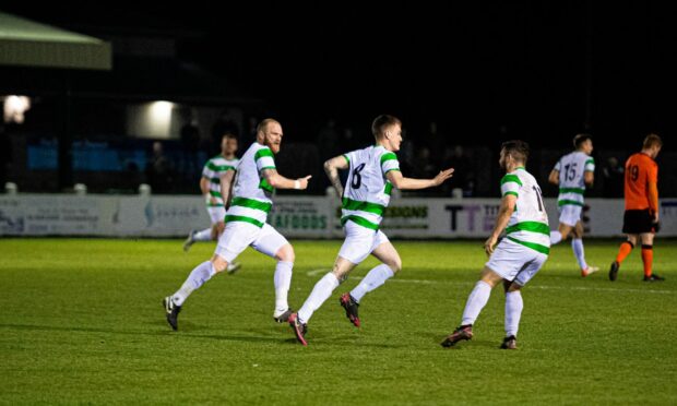 Kyle MacLeod, centre, celebrates scoring Buckie Thistle's equaliser against Rothes
