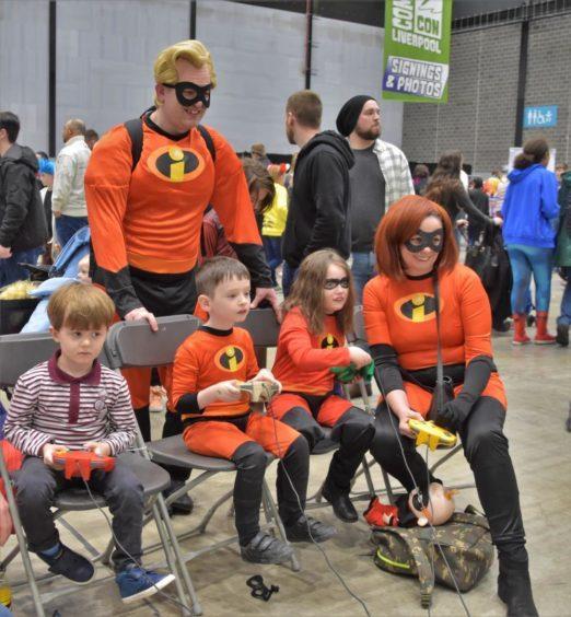A family cosplay as the Incredibles at Comic Con Liverpool
