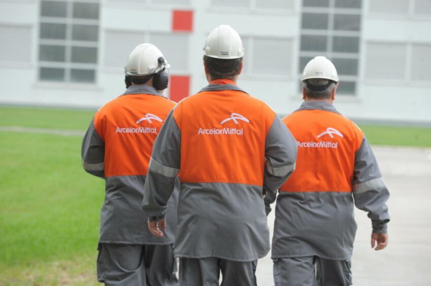 Workers at a AcelorMittal plant in Poland.