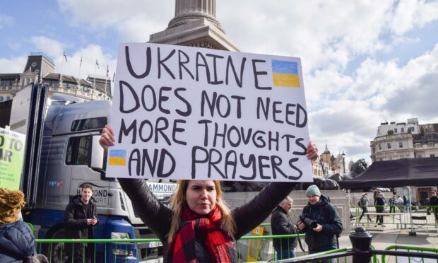 A protester in Trafalgar Square, London (Photo: Vuk Valcic/Zuma Press Wire/Shutterstock)