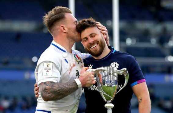 Scotland's Stuart Hogg and Ali Price celebrate with the Cuttitta Cup
after the win over Italy.