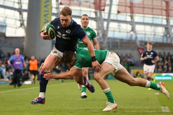 Stuart Hogg leads the change for Scotland in Dublin.