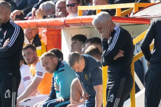 Dons boss Jim Goodwin was dejected following the 2-1 loss to Livingston