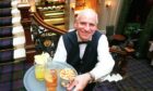 Station hotel barman Robbie Van Reenen, on his 65th birthday.