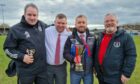 St Duthus winners, from left: assistant manager Justin Rogers, coach Robbie Ross, boss Alan Geegan and physio Ian Christie.