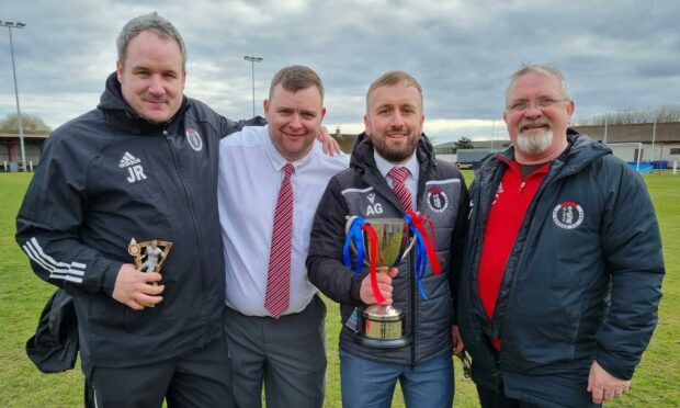 St Duthus winners, from left: assistant manager Justin Rogers, coach Robbie Ross, boss Alan Geegan and physio Ian Christie.
