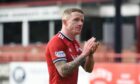 Aberdeen's Jonny Hayes applauds the large travelling support after the 2-2 draw at Dundee.