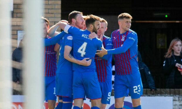 ICT's Shane Sutherland (centre) celebrates after opening the scoring at Ayr at the weekend.