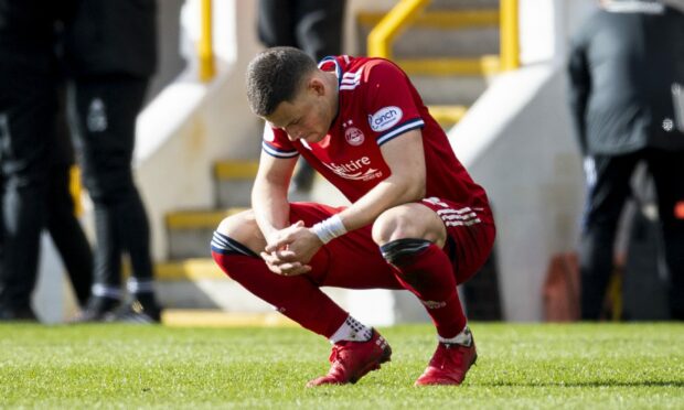 Aberdeen's Christian Ramirez looks dejected after losing to Ross County.