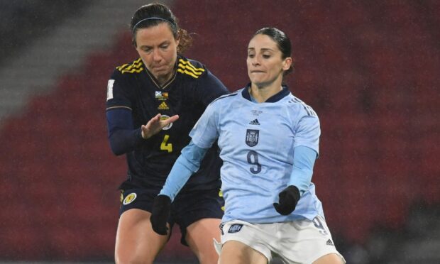 Rachel Corsie comes up against Esther Gonzalez - who has been named in the provisional Spain squad - at Hampden. Image: SNS.