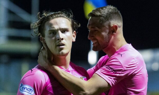 Logan Chalmers (left) celebrates his winner against Kilmarnock with Robbie Deas.