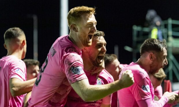 Caley Thistle defenders David Carson and Robbie Deas celebrate after Logan Chalmers' winner against Kilmarnock.