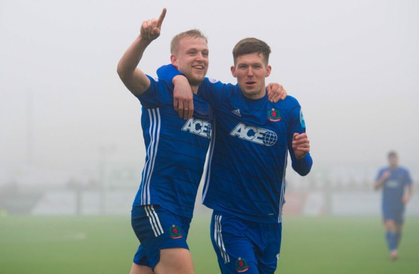 Cove Rangers defender Harry Milne celebrates his goal against Alloa with Jamie Masson