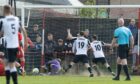 Fraserburgh's Paul Young, number 10, forces home their goal against Bonnyrigg Rose Athletic