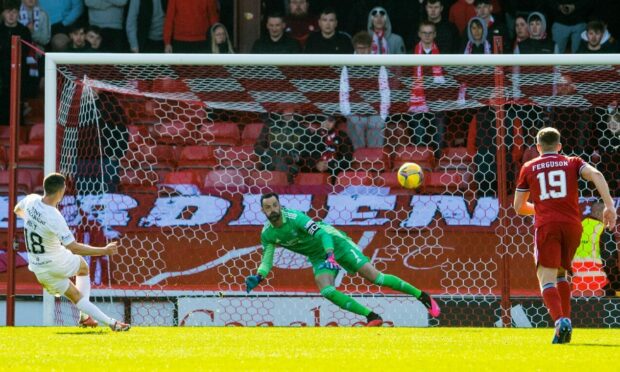 Jason Holt scores to make it 2-0 Livingston against Aberdeen.