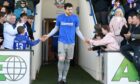 Cove Rangers goalkeeper Stuart McKenzie greets the fans after the win over Dumbarton