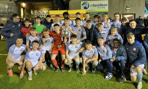 Turriff United Under-21s celebrate winning the GPH Builders Merchants Aberdeenshire League 2021-22.