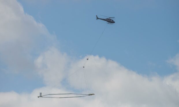 The helicopter was operating a scanner in a field in Aberdeenshire when it hit a powerline. Image: Aberdeen Minerals.