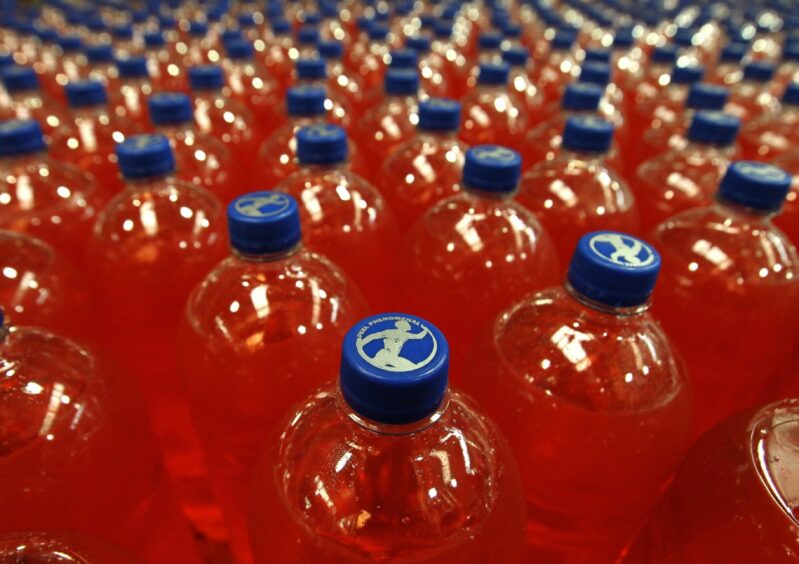 Bottles of Irn-Bru in the production hall at AG Barr's factory in Cumbernauld. 