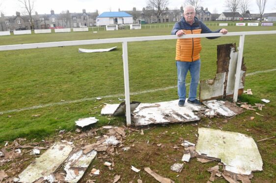 Colony Park FC groundsman Sandy Robertson surveys the damage caused by vandals. Picture by Chris Sumner