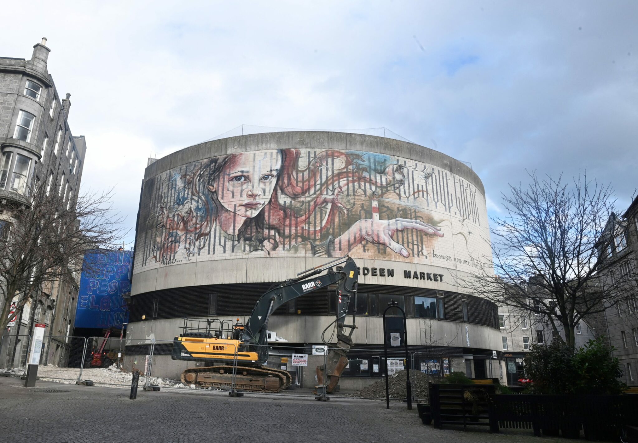 Aberdeen market glass front: Why is it allowed on Granite Mile?